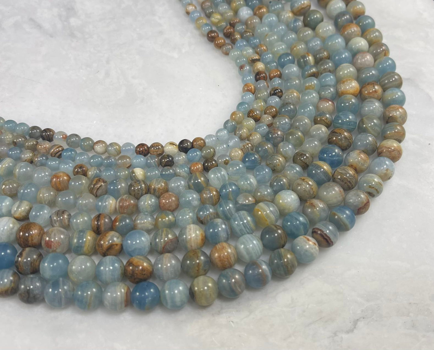 Lemurian Aquatine aka Blue Calcite, Blue Onyx, Round