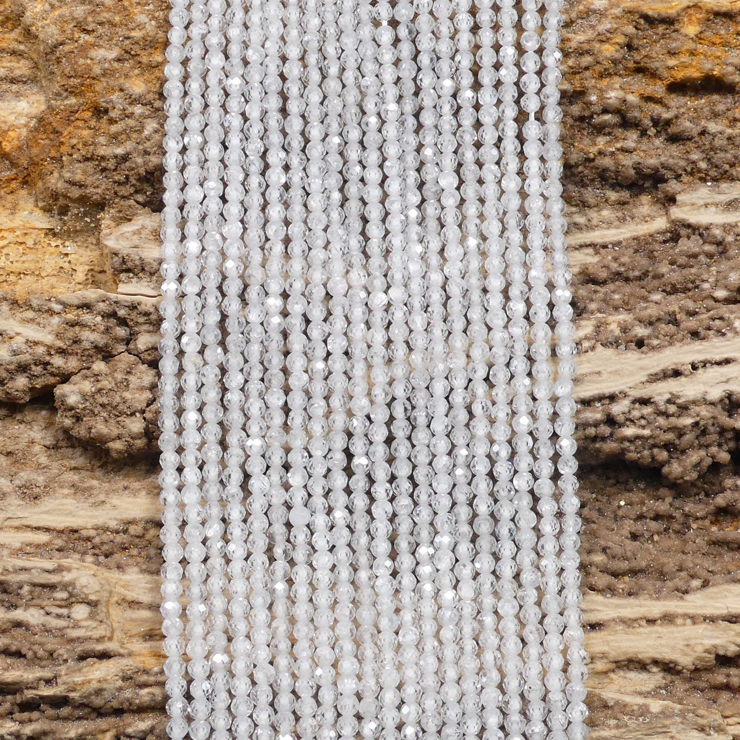 White / Clear Zircon Micro Faceted Round 2mm
