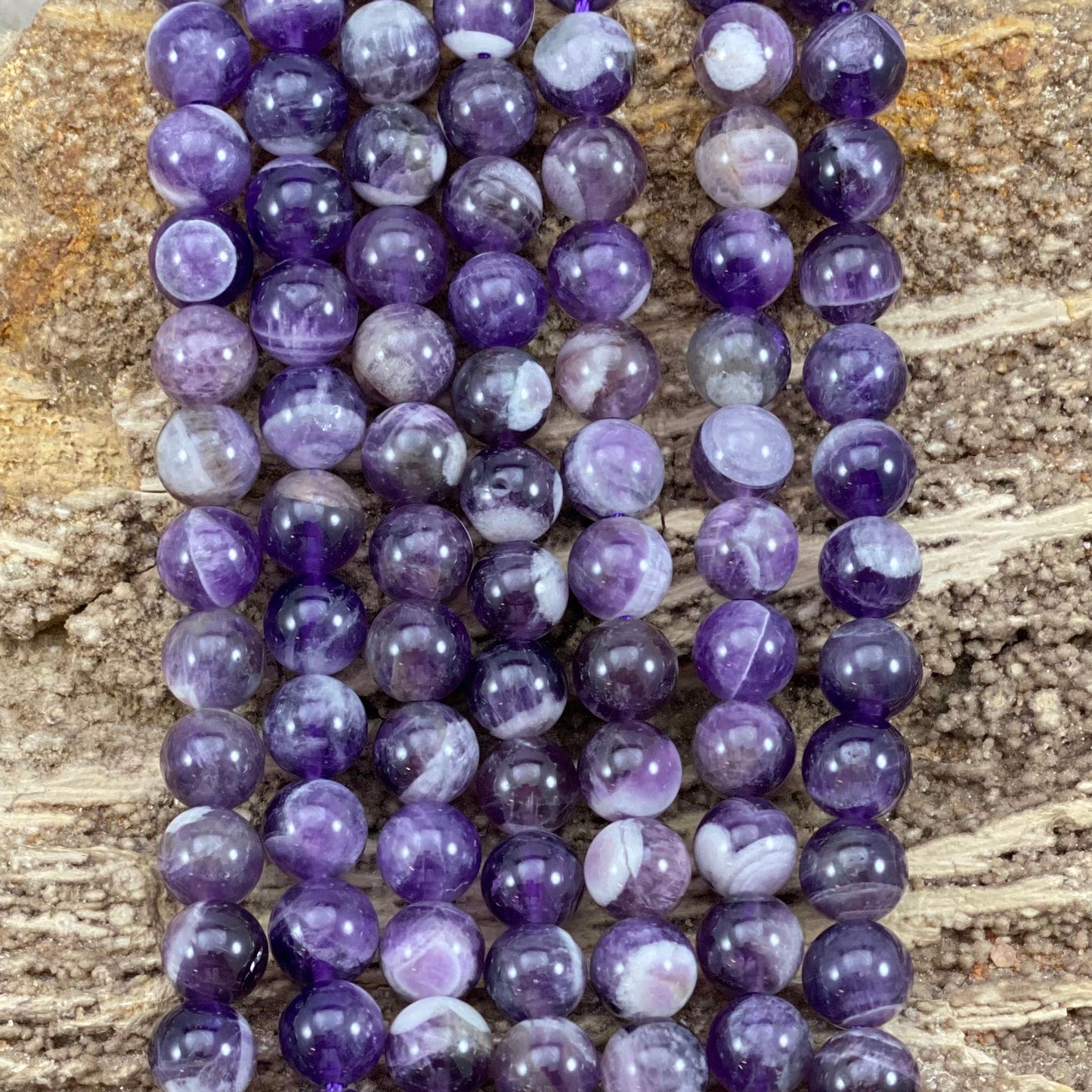 Dog Tooth Amethyst Round